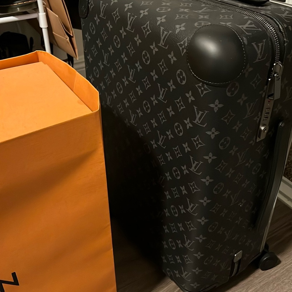 Louis Vuitton Horizon 55 luggage brand new in original box and bag never used